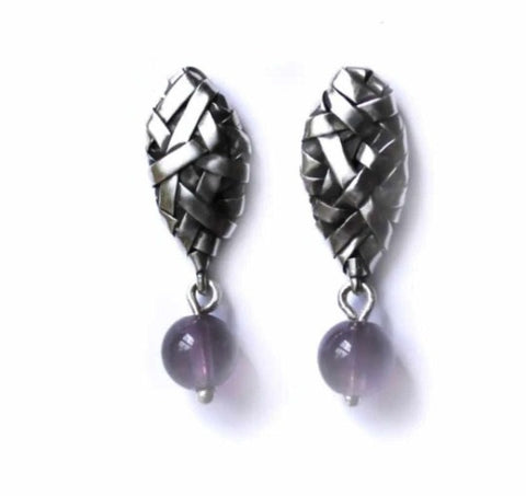 woven petal and amethyst earrings handcrafted in silver by jewellery designer P Gurgel Segrillo