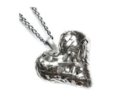 woven 3D heart pendant, handcrafted in silver by contemporary jewellery designer gurgel-segrillo